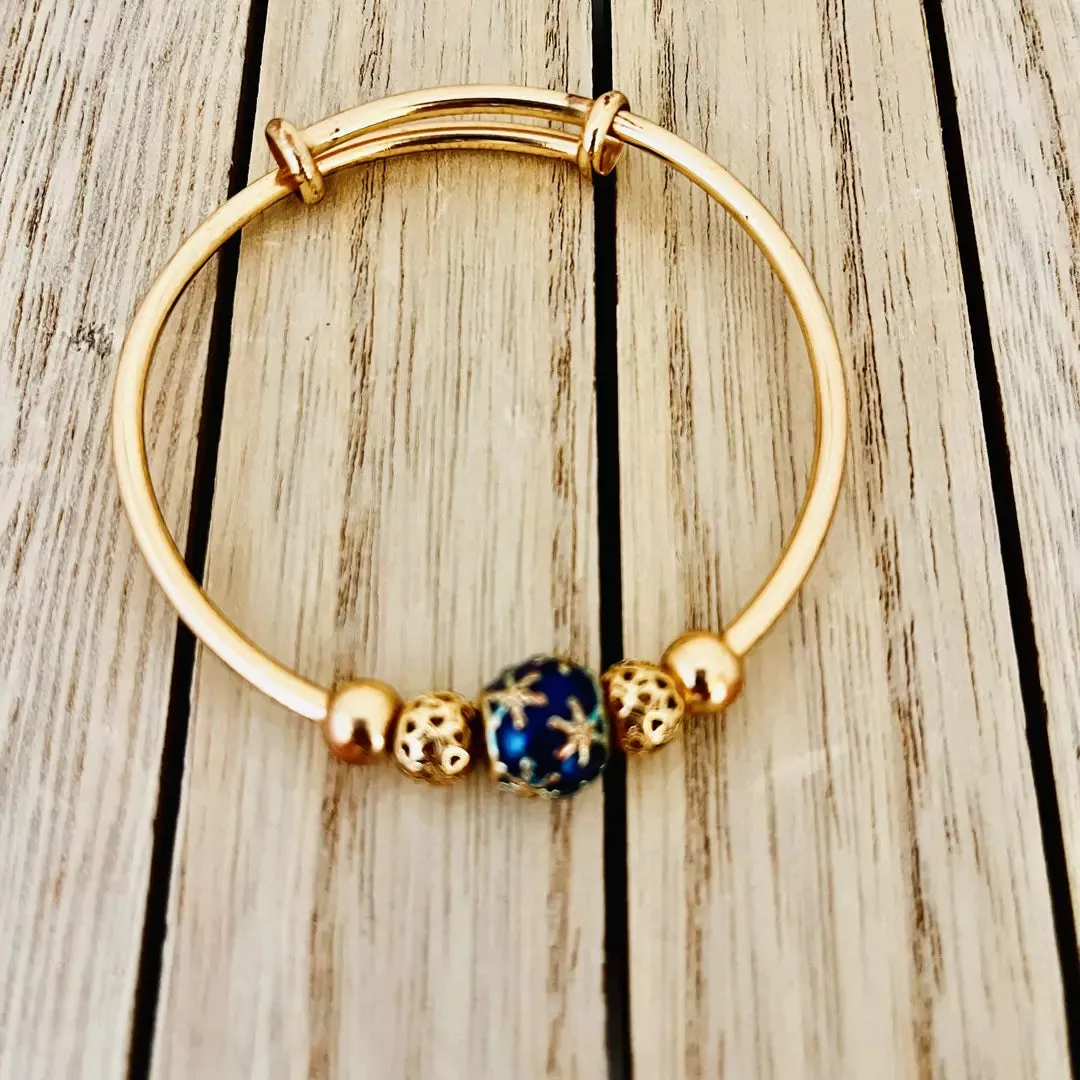 14k golden plated bangle with  golden round beads